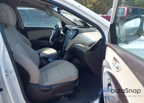 2014 Hyundai Santa Fe Sport 2.4L z USA, uszkodzony, nr VIN 5XYZU3LB1EG191178